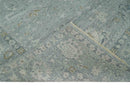 Distressed finished 8x10 Gray and Silver Low Pile wool Rug