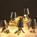 Articulated golden man table lamp for bedroom night light by Decorbites