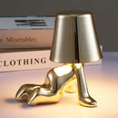 Articulated golden man table lamp for bedroom night light by Decorbites