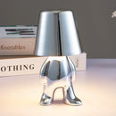 Articulated golden man table lamp for bedroom night light by Decorbites