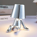 Articulated golden man table lamp for bedroom night light by Decorbites