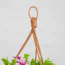 13” UV Resistant Artificial Lily and Eucalyptus Woven Hanging Basket (Indoor/Outdoor)
