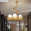 GobekUsa Artistry Milk White Glass Ball Chandelier Pendant with Birds and Hand-Sewn Aluminum Nest - 1/2/3-Light Golden Hanging Lamp