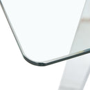 A modern minimalist rectangular glass dining table with tempered glass tabletop and silver metal legs, suitable for kitchens, restaurants, and living rooms,63"x35.4"x30"