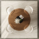 Round Glass Dining Table With Stainless Steel Legs And Chairs by HouseOfZazla
