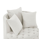 Modern Upholstered Swivel Chair With Button Tufted Design And Movable Wheels by HouseOfZazla