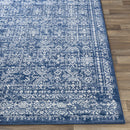 Michie Dark Blue Area Rug - Clearance