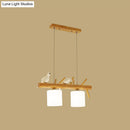 GobekUsa Beige Drum Island Lighting: Simple 2/3 Heads Pendant Lamp with Opaque Glass and Bird on Wood Branch Design