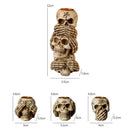 Beige resin bone skeleton candlestick holder set dining room decor by Decorbites