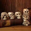 Beige resin bone skeleton candlestick holder set dining room decor by Decorbites