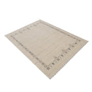 Beige Tribal Border Hand Loomed Wool Area Rug