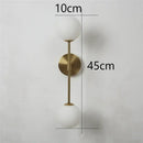 Black and gold glass wall lamp bedroom dual globe sconce by Decorbites
