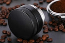 Black and silver espresso distributor coffee leveler kitchen tool by Decorbites