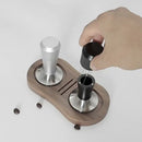 Black and stainless steel coffee distributor tamper set kitchen tool by Decorbites