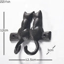 Black cast iron cat hook hanging shelf outdoor wall decor by Decorbites