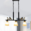 GobekUsa Black Island Pendant with 3 Tan Glass Shades and Bird Deco - Traditional Dining Room Ceiling Light