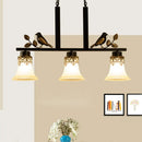 GobekUsa Black Island Pendant with 3 Tan Glass Shades and Bird Deco - Traditional Dining Room Ceiling Light