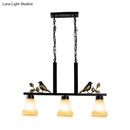 GobekUsa Black Island Pendant with 3 Tan Glass Shades and Bird Deco - Traditional Dining Room Ceiling Light