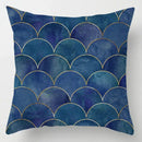 Blue geometric marble throw pillows for living room decor by Decorbites