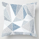 Blue geometric marble throw pillows for living room decor by Decorbites