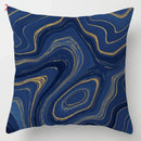 Blue geometric marble throw pillows for living room decor by Decorbites