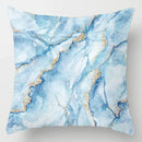 Blue geometric marble throw pillows for living room decor by Decorbites