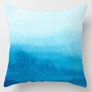 Blue geometric marble throw pillows for living room decor by Decorbites
