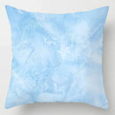 Blue geometric marble throw pillows for living room decor by Decorbites