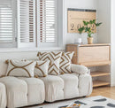Boho cream & tan geometric tufted fringe cushion cover living room by Decorbites