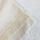 Boho style beige linen cushion cover with tassels living room decor by Decorbites