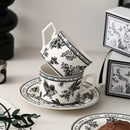 Botanical black bird ceramic coffee cup and saucer set dining room by Decorbites