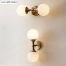 GobekUsa Ivory Glass Ball Wall Lamp with 2-Head Brass Sconce for Bedroom