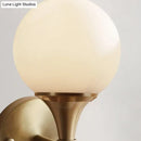 GobekUsa Ivory Glass Ball Wall Lamp with 2-Head Brass Sconce for Bedroom