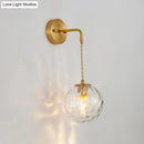 GobekUsa Brass Bedside Wall Sconce Light with Water Glass Shade - Simplicity at Its Finest!