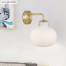 GobekUsa Brass Wall Sconce with Oblong Milk White Glass Shade - Modern Balcony Light