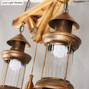 GobekUsa Bronze Coastal Glass Lantern Pendant Light - 4-Light Island Fixture