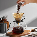 Brown filter paper coffee cone – kitchen brewing accessory by Decorbites