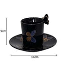 Butterfly pattern ceramic cup and saucer set cream & black dining room by Decorbites
