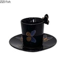 Butterfly pattern ceramic cup and saucer set cream & black dining room by Decorbites