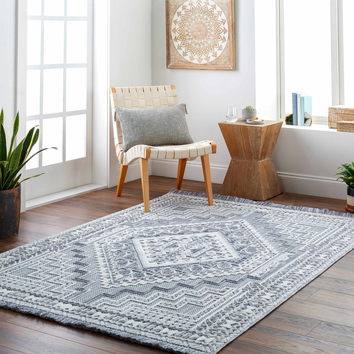 Alya Charcoal Textured Area Rug, installed in a room