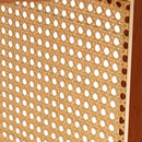 A natural and elegant deep red wooden coffee table with artificial rattan decorations, perfect for a fashionable living room and comfortable tea drinking time