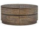 Baisden - Round Lift Top Cocktail Table With Casters - Tobacco