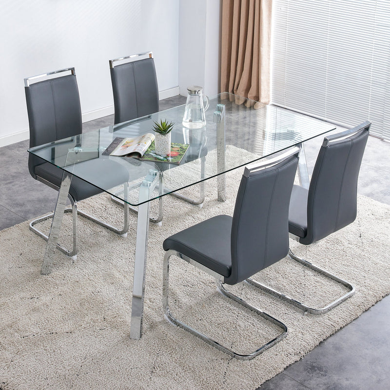 A modern minimalist rectangular glass dining table with tempered glass tabletop and silver metal legs, suitable for kitchens, restaurants, and living rooms,63"x35.4"x30"