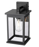 11"H Bowton II Outdoor Wall Light - Dusk to Dawn Matte Black Finish with Glass Shade by Millennium Lighting