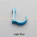 Candy color metal wall hooks for bathroom towels and coats by Decorbites