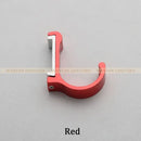 Candy color metal wall hooks for bathroom towels and coats by Decorbites