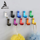 Candy color metal wall hooks for bathroom towels and coats by Decorbites