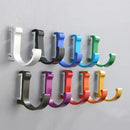 Candy color metal wall hooks for bathroom towels and coats by Decorbites