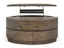 Baisden - Round Lift Top Cocktail Table With Casters - Tobacco