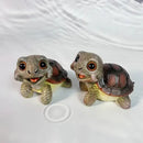 Charming green & pink crawling turtle sculpture garden decor by Decorbites